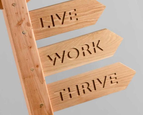 Live, work and thrive sign