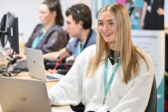 Apprentice using their laptop at a desk