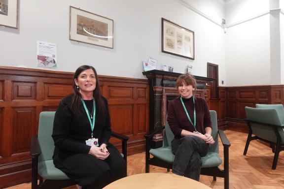 two members of the resettlement team in kendal town hall