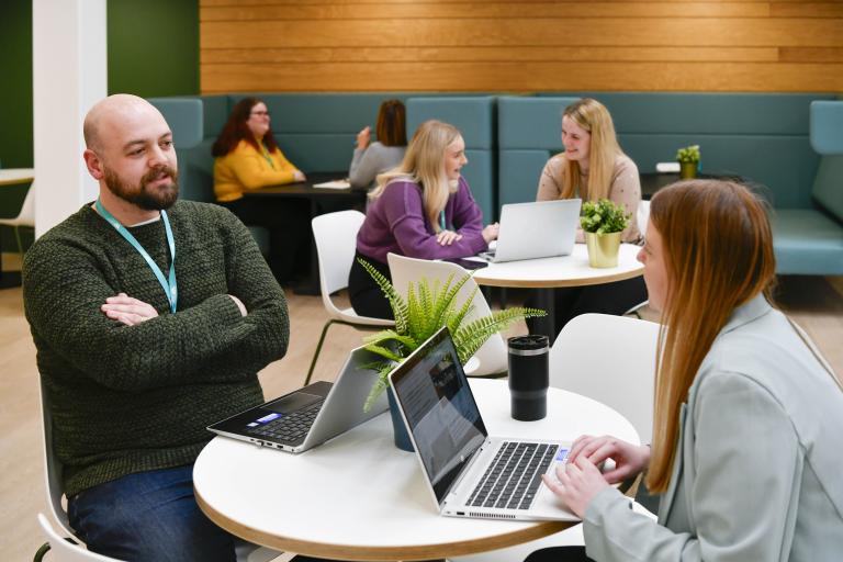 Two colleagues working together in South Lakeland House