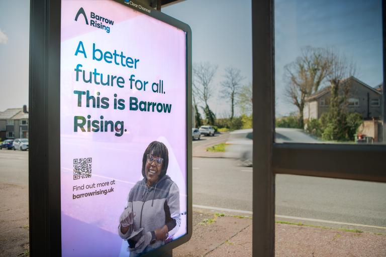 Bus shelter Barrow Rising advert