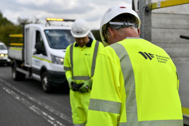 Two Highways staff members carrying out their roles
